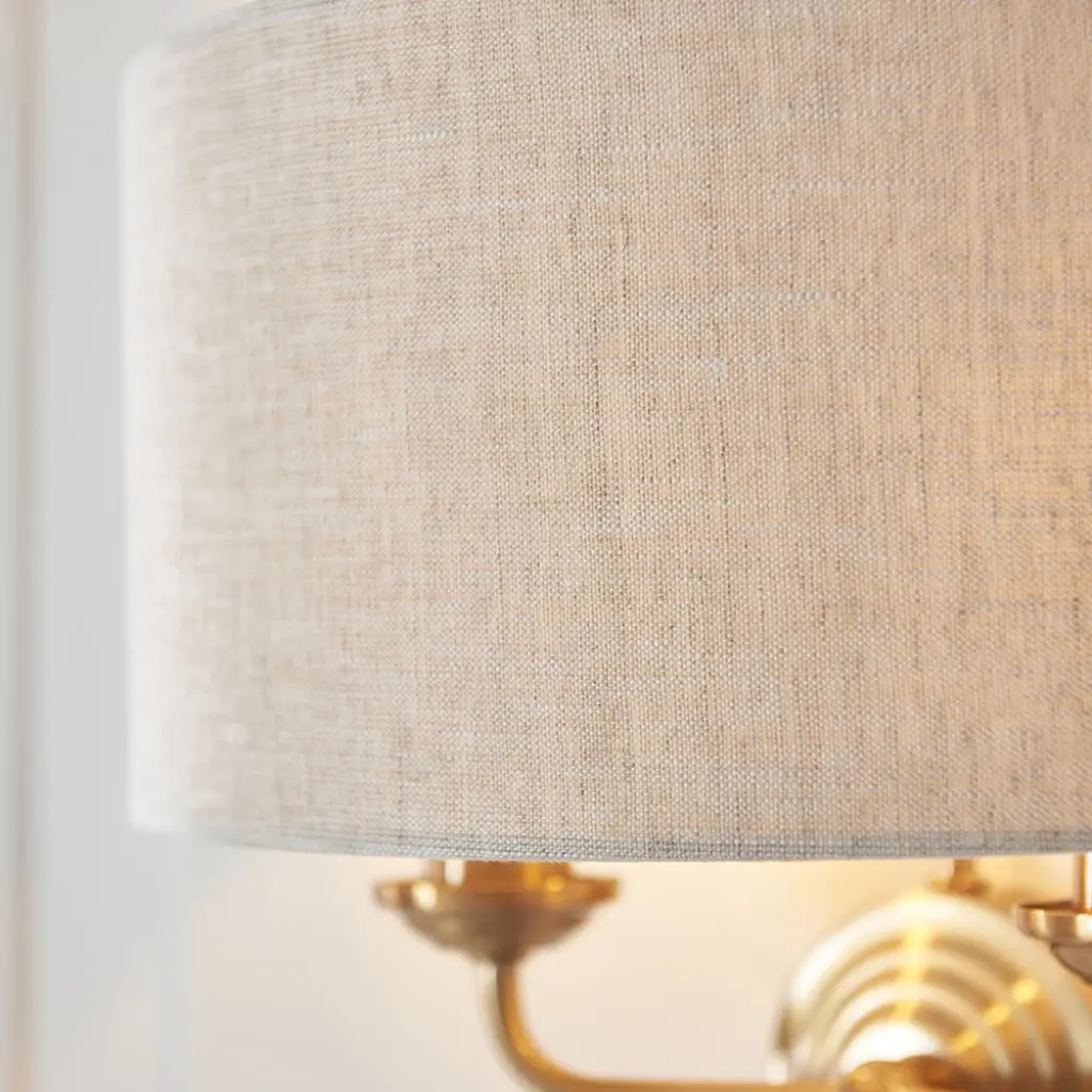 Highclere 2 Light Wall Light in Brass C/W Natural Shade