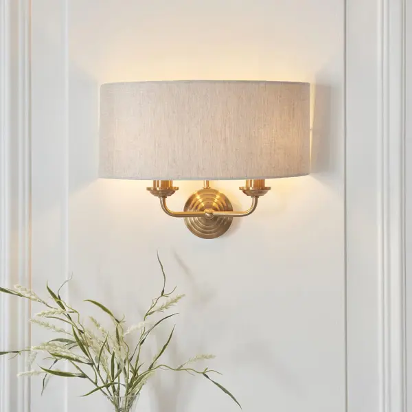 Highclere 2 Light Wall Light in Brass C/W Natural Shade