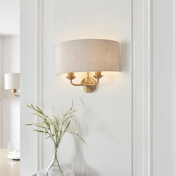 Highclere 2 Light Wall Light in Brass C/W Natural Shade