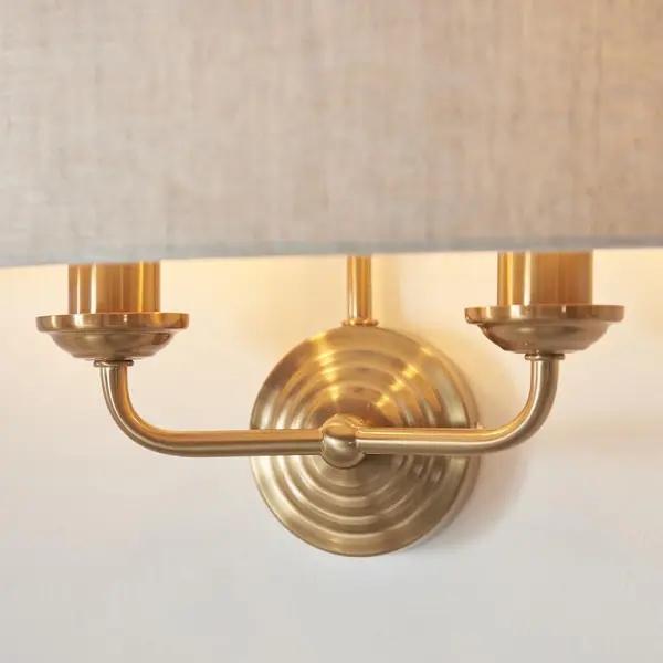 Highclere 2 Light Wall Light in Brass C/W Natural Shade
