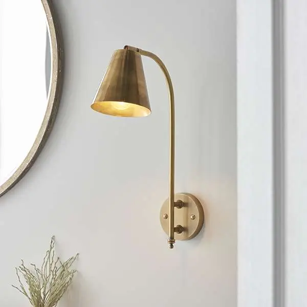 Radha Wall Light in Brass Finish